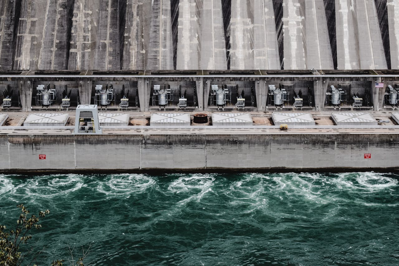 A stunning aerial view of the hydro power plant at Niagara Falls, showcasing engineering marvels and rushing water.